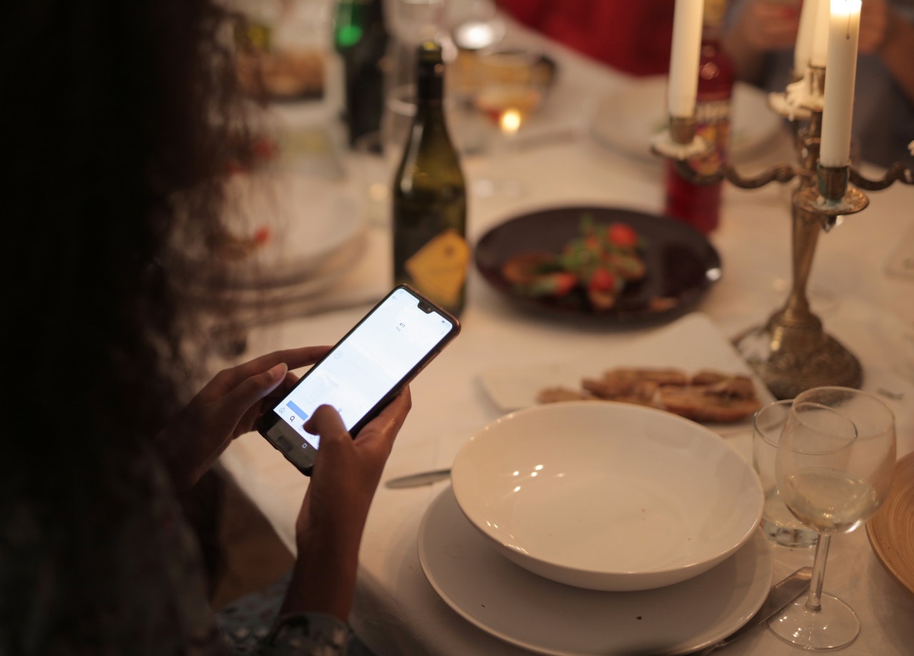 person-holding-smartphone-3938730.jpg